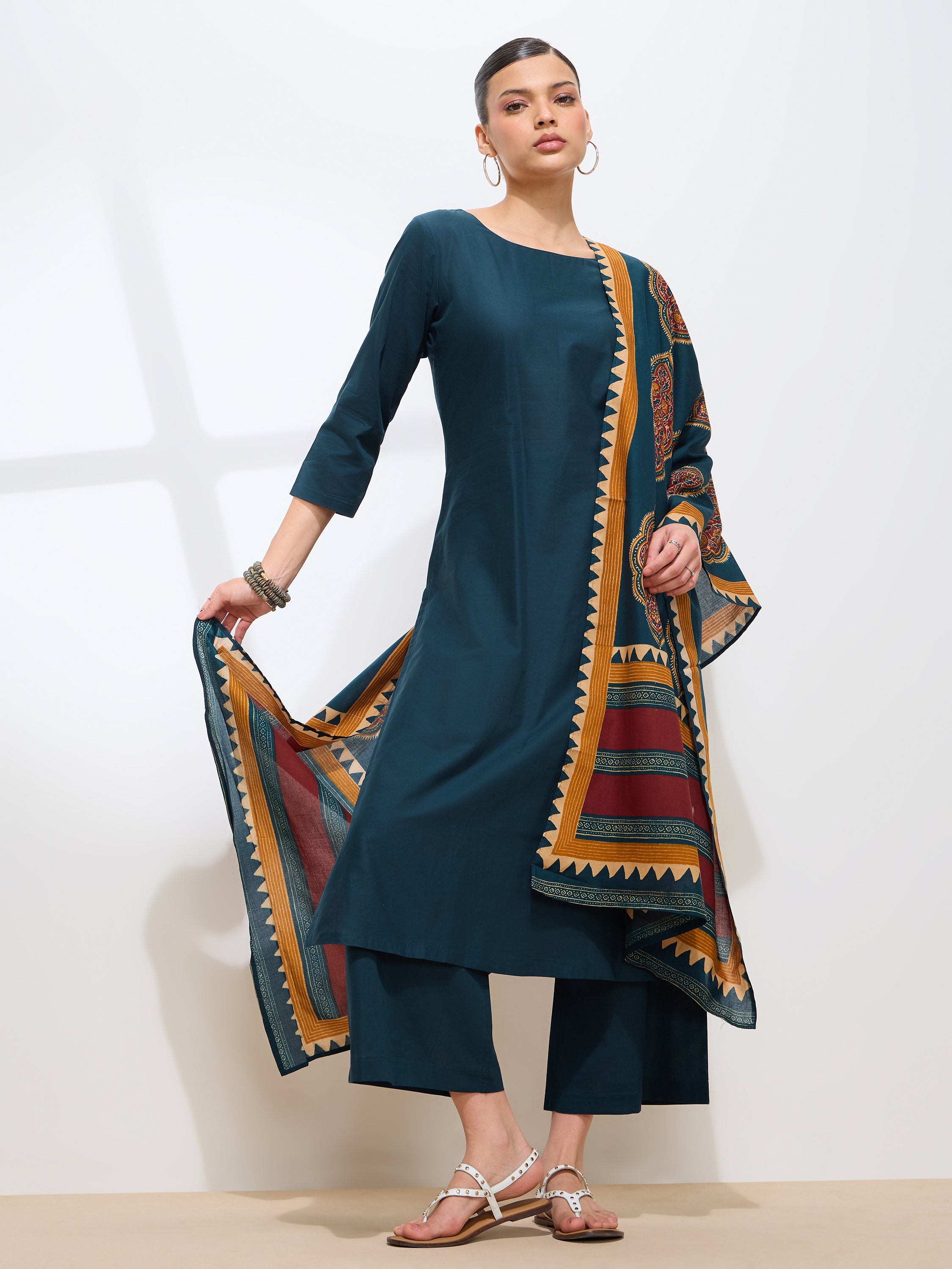 Graceful Teal Solid Solid Pure Cotton Kurta set