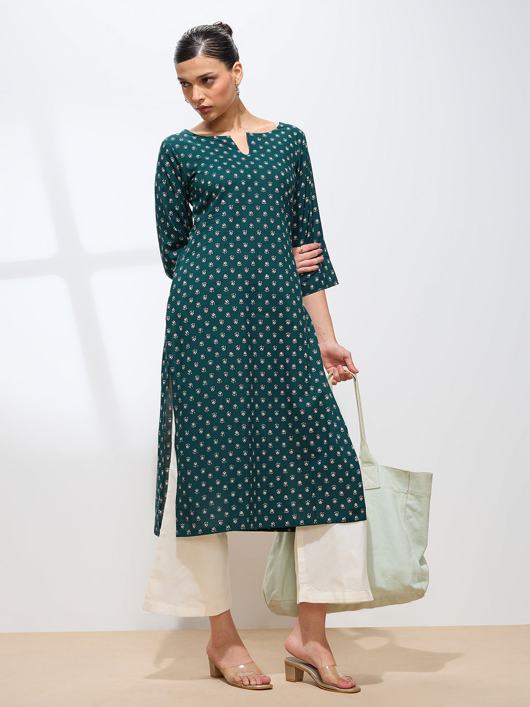 Graceful Teal Printed Floral Cotton Kurta