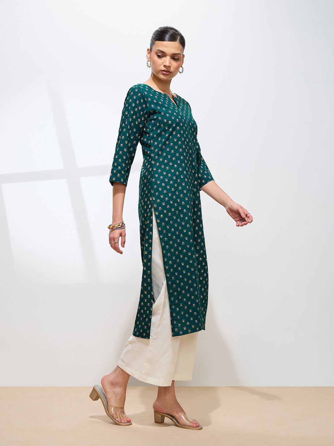 Graceful Teal Printed Floral Cotton Kurta