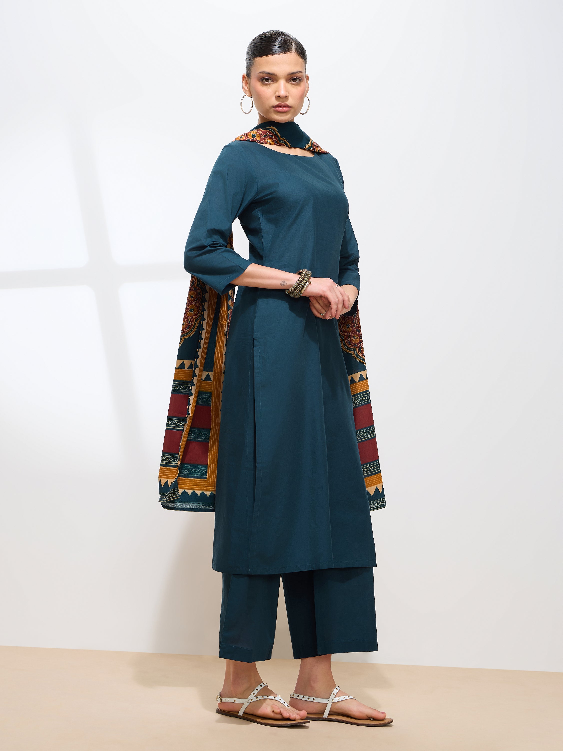 Graceful Teal Solid Solid Pure Cotton Kurta set